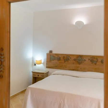 アパートホテル Porto Giunco 2*