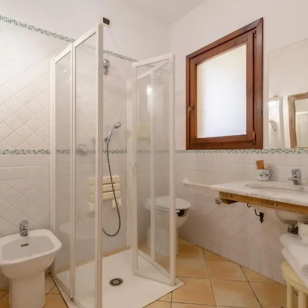 Porto Giunco מלון דירות וילסימיוס